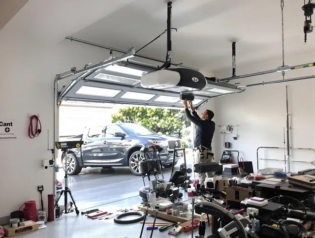 Abington Garage Door Repair specialist installing smart garage door opener system in Abington home
